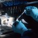 Global Study Finds New Coronavirus Mutation Spreads Fast But Lacks Severity 8 Scientist testing samples in a lab