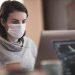 Majority Testing Positive For Coronavirus Have No Symptoms 9 woman working and wearing mask