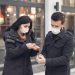 CDC Response Team Says Coronavirus Cases Rates Higher Than Reported 8 Image of Young couple wearing masks disinfecting hands