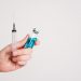 Potential COVID-19 Vaccines Move Towards Final Testing Phase 8 Doctor hands holding COVID-19 vaccine and injection