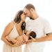 Not Every Woman Needs A Pain Reliever During Childbirth 9 Image of Mother and father holding newborn baby and laughing