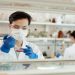 Breakthrough In Protein Treatment Trial For Coronavirus 7 Image of a Scientist conducting a sample test in Laboratory