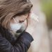 People Experience Fatigue In Coronavirus Pandemic 8 Image of a woman feeling fatigue and wearing mask