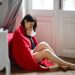 Researchers Identify Six Distinct Types Of COVID-19 7 Woman having flu sitting on floor