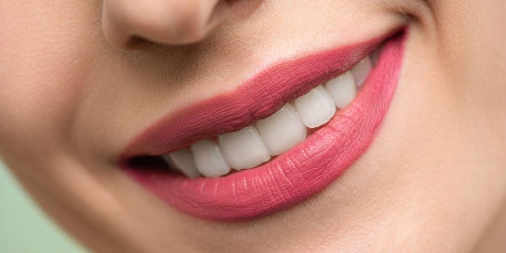 woman with healthy beautiful teeth smiling