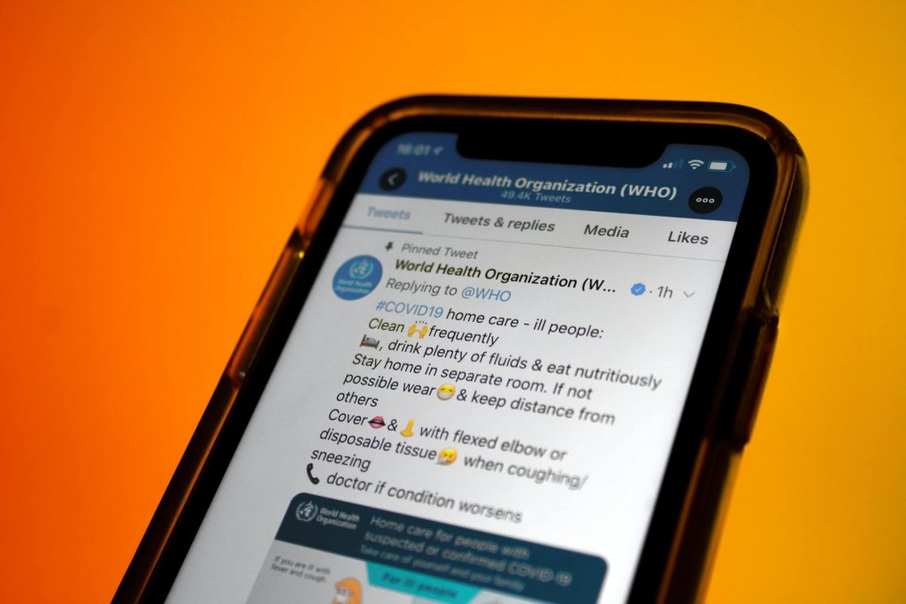 Smart phone display of World Health Organization social media page