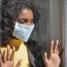 CDC Released Data On COVID-19 Deaths 7 A serious young ethnic woman at home wearing medical mask