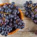 Benefits of Healthy Foods Rich in Antioxidants 7 Purple grapes in basket on a wooden background