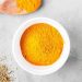 Turmeric: Health Benefits And Nutritional Components 11 Turmeric powder in white bowl on a marble background