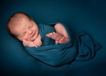 A study says newborns’ brains have similarities to adults 3 A photo of a beautiful child smiling during photoshoot