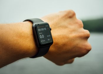 5 Mental Health Benefits of Exercise You Should Know 27 A person using Apple Smart Watch for exercise tracking