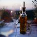 Olive oil bottle placed on a dinner table